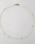 3.0 - 3.5mm White Seed Bead Nucleated Freshwater Pearl Necklace w/Gold Beads - Marina Korneev