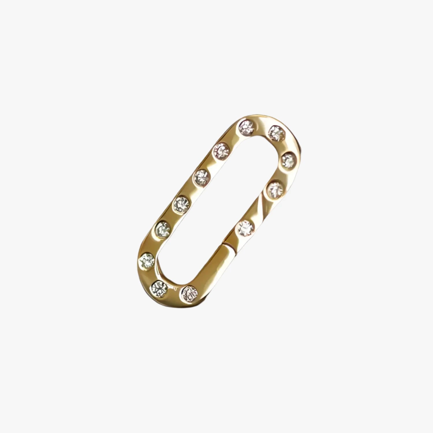 a gold colored metal buckle with diamonds on it
