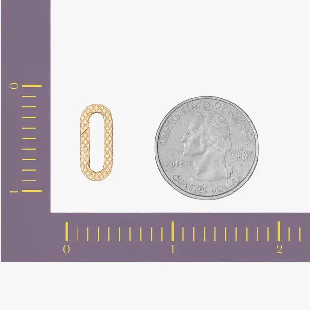 a dime with a ruler next to it