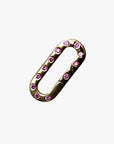 a pink and gold metal object with pink stones