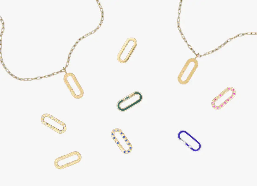 a group of different colored paper clips on a chain
