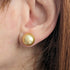 11-12mm Golden South Sea Pearl Stud Earrings, worn on model