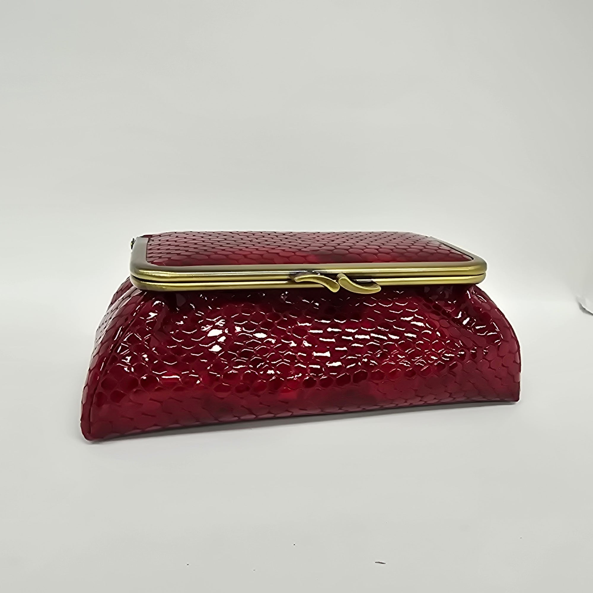 Laquered Red Snake Genuine Leather Travel Bag brushed bronze frame front view