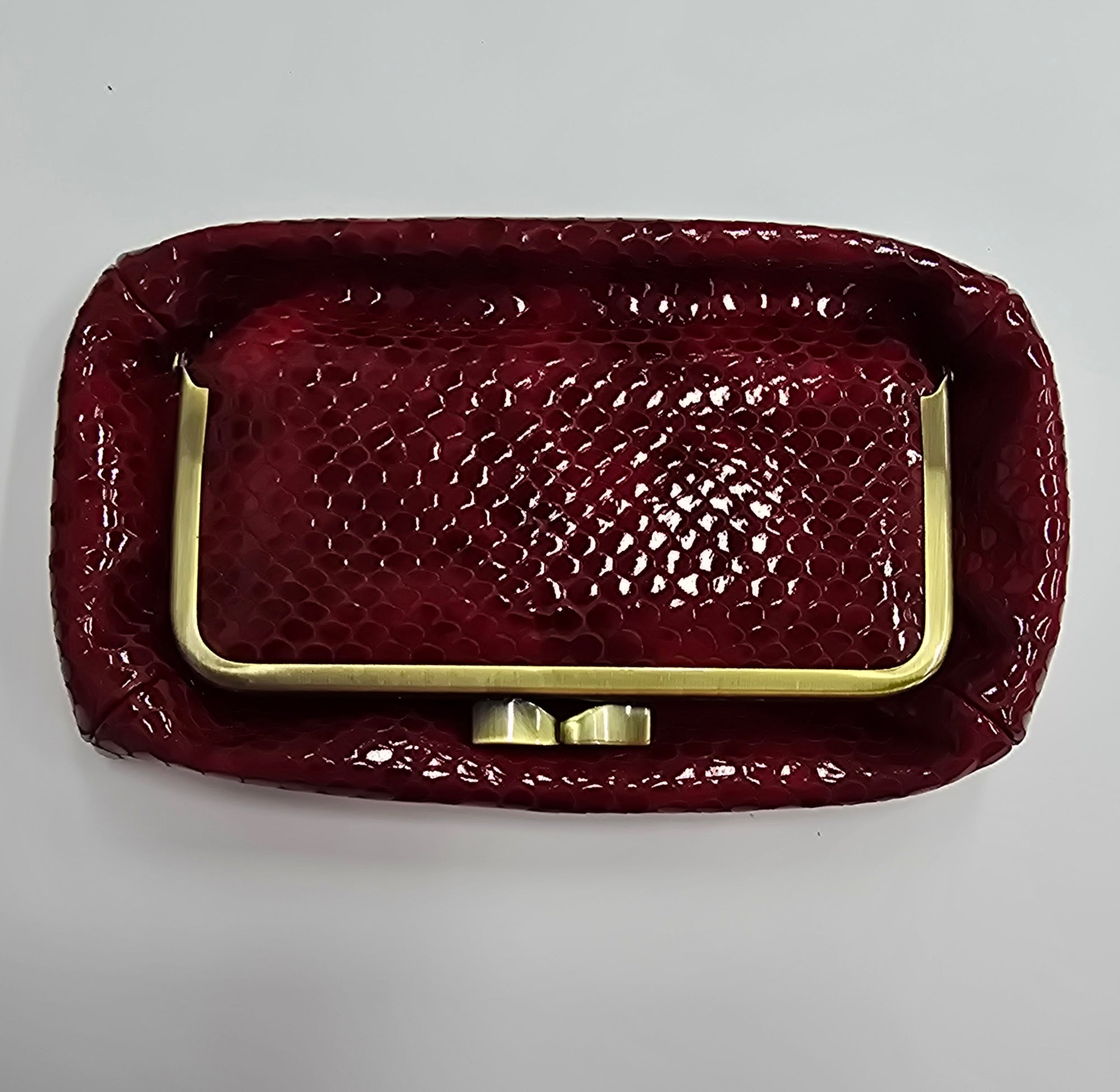 Laquered Red Snake Genuine Leather Travel Bag brushed bronze frame sky view collapsed