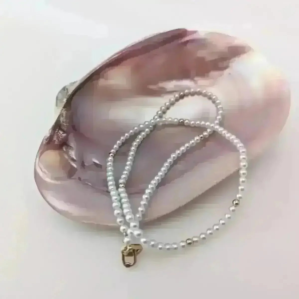 3.0 - 3.5mm White Seed Bead Nucleated Freshwater Pearl Necklace w/Gold Beads - Marina Korneev