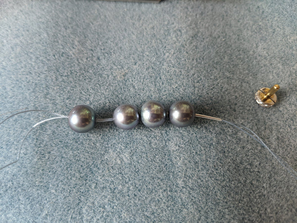 Step 9: French wire positioned by the last pearl.