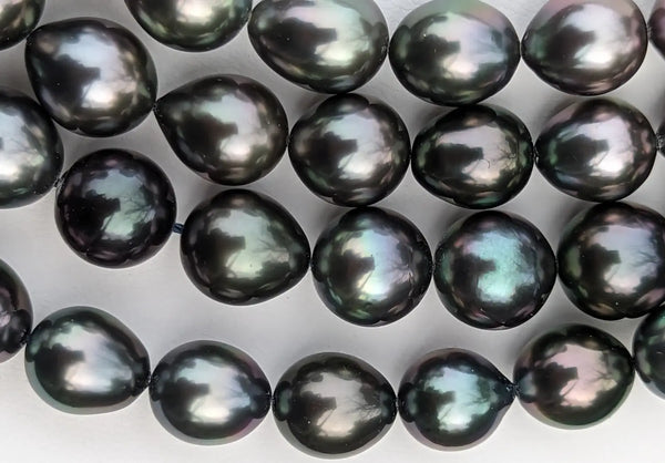 What qualities make one pearl more valuable than another?