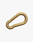 a gold colored rope ring on a white background