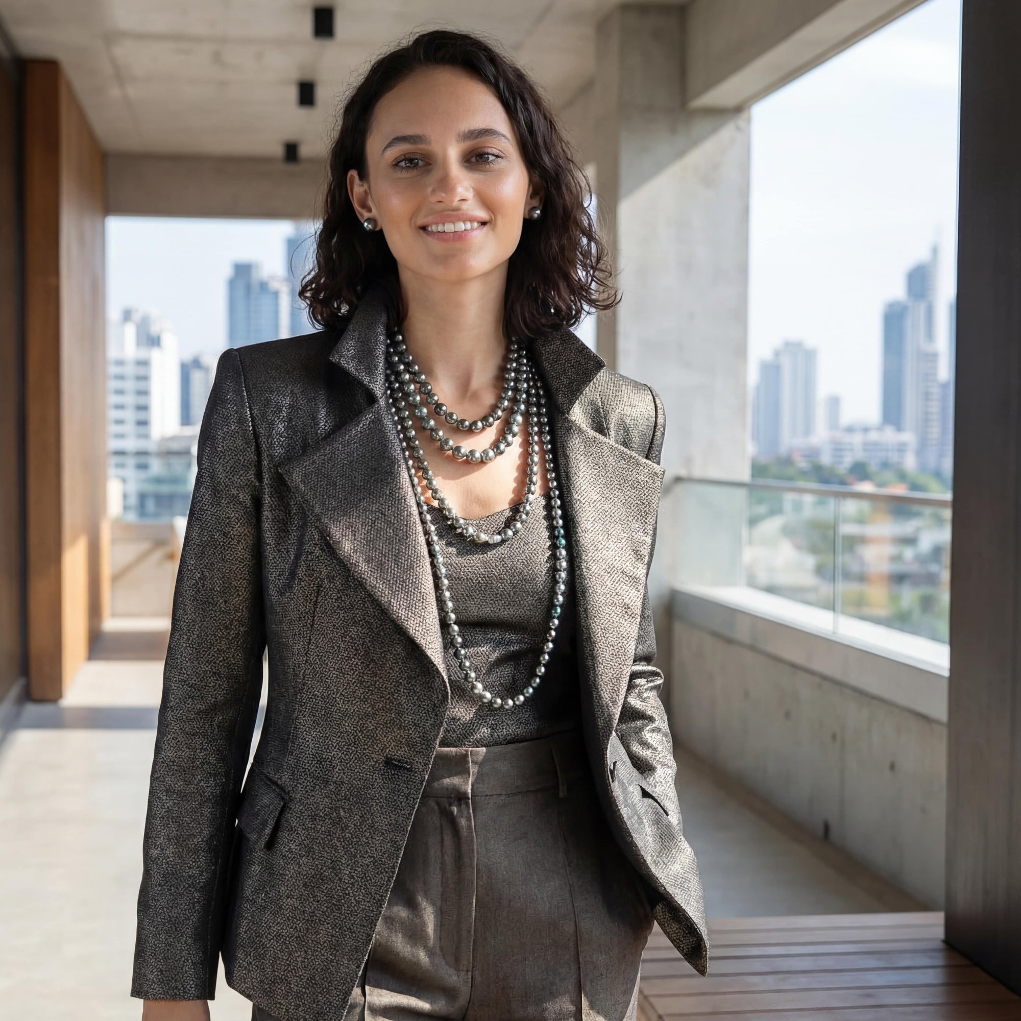 woman wearing 4 strands of Tahitiam pearls - Marina Korneev