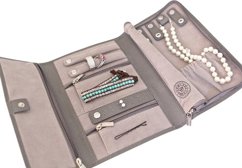 Gray jewelry travel organizer with compartments for essential pearl care and freshwater pearls