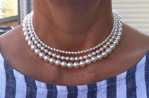 Multi-strand pearl necklace featuring graduated sizes, showcasing Majorica Pearls elegance.