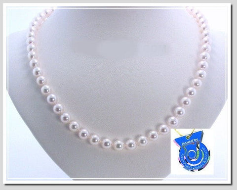 Pearl necklace showcasing uniform white pearls, ideal for understanding pearl quality when purchasing pearls