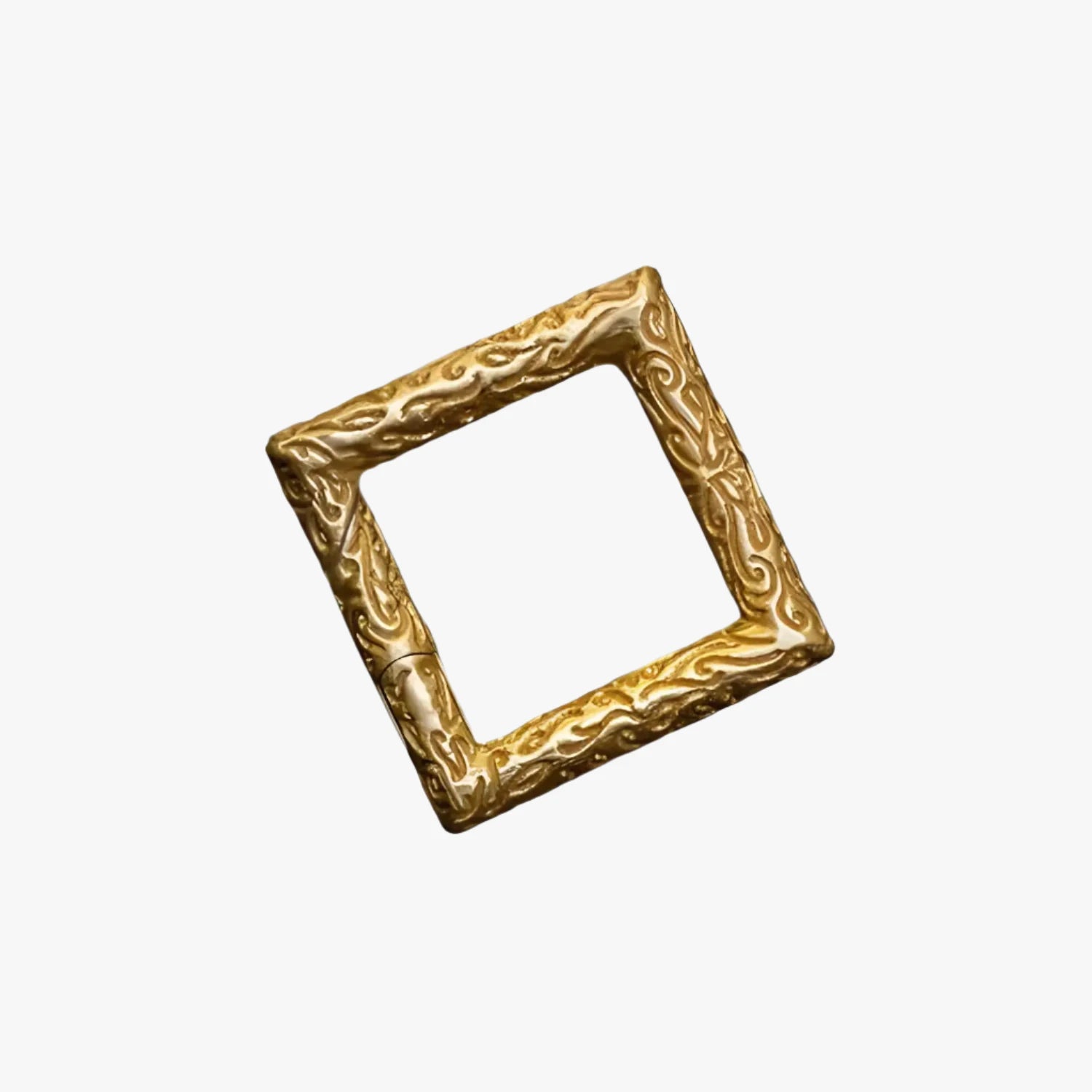 a gold square frame with a pattern on it