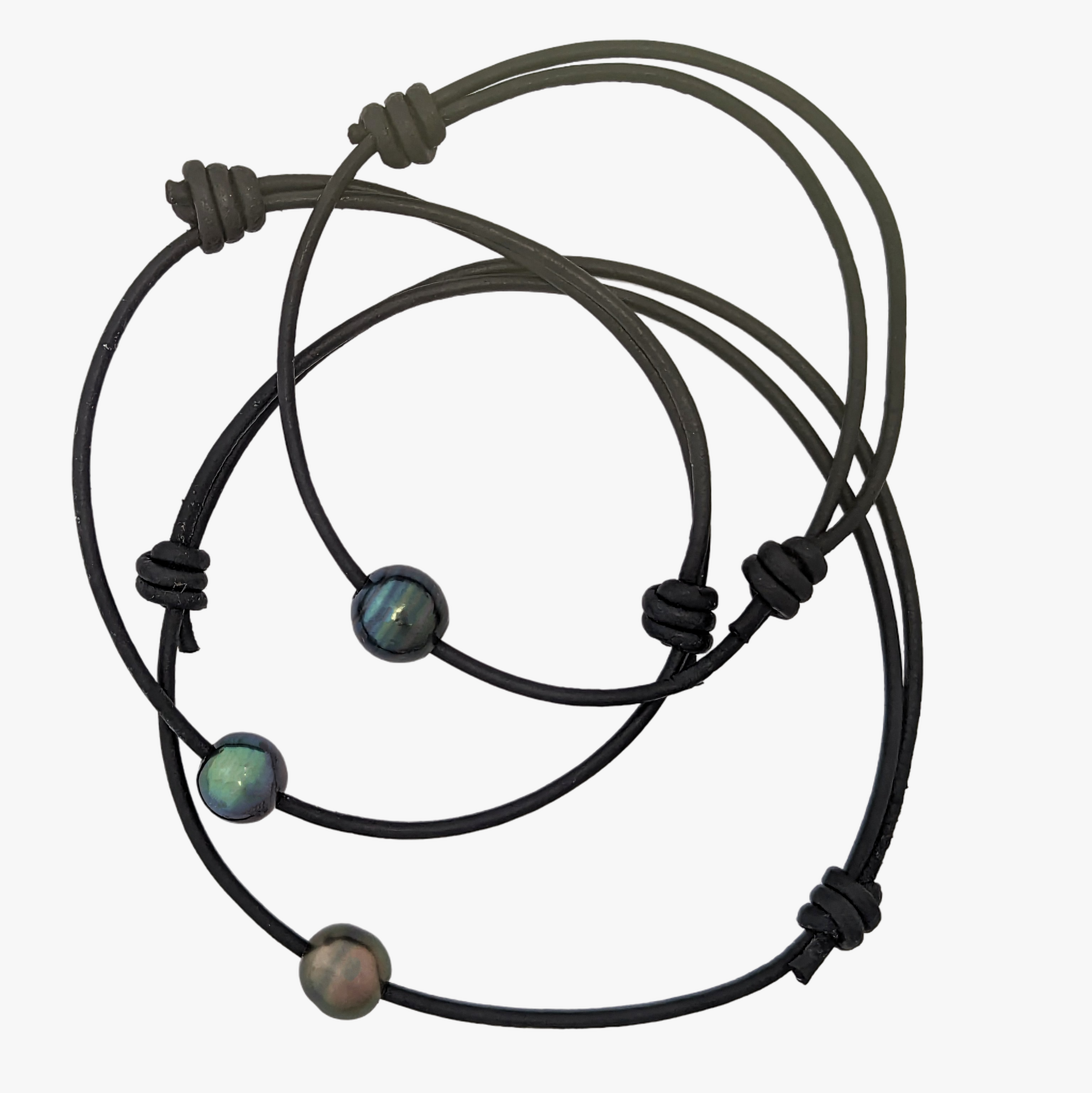 a set of three leather bracelets with beads